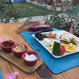 Flaming dessert being served, creating a spectacular show